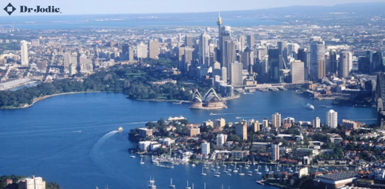Aerial view of Sydney showcasing the city skyline and business district, representing executive coaching and leadership growth in 2025