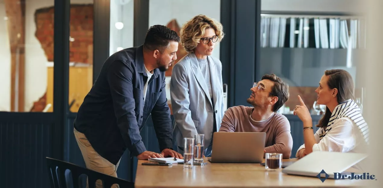 workplace team discussing ai adoption and decision making in a corporate office