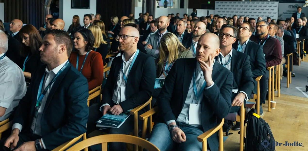Corporate audience attending a keynote presentation at a business event in Sydney.