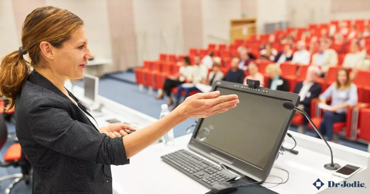 Professional keynote speaker presenting to an engaged corporate audience.
