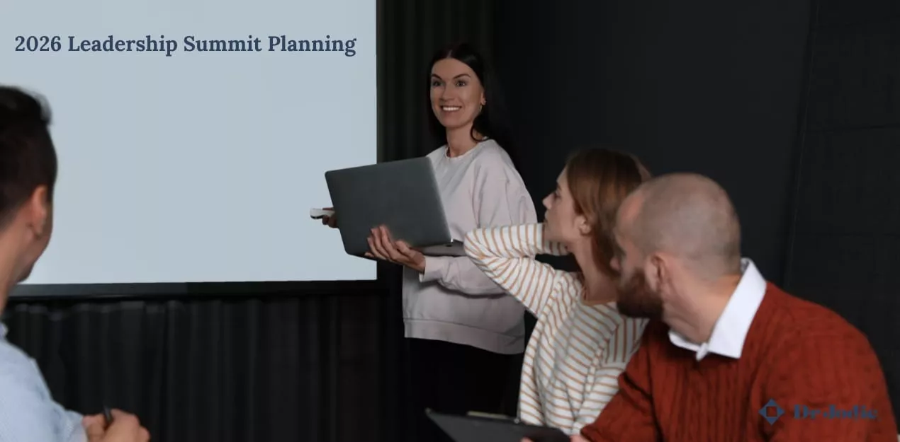 Corporate event planner reviewing keynote speaker options and event objectives.
